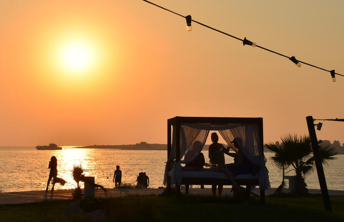 Enjoying cocktails at sunset